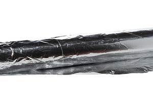 Roll of gray foil for baking and packaging food on a white backg, a Food & Drink Photo by ndanko
