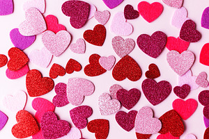 Stylish valentine hearts flat lay. Pink and red glitter hearts o, a Holiday Photo by Sonjachni