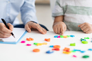 Private child lessons. Little boy counting colorful numbers, studying with prof, a Photo by Prostock-Studio (Thumbnail 2 of 2)