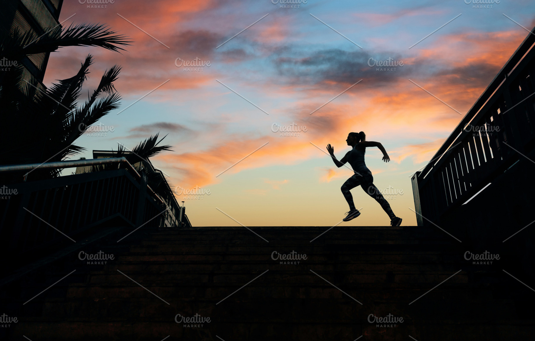Female runner silhouette running over urban background with palm, a Sports & Recreation Photo by davidpereiras