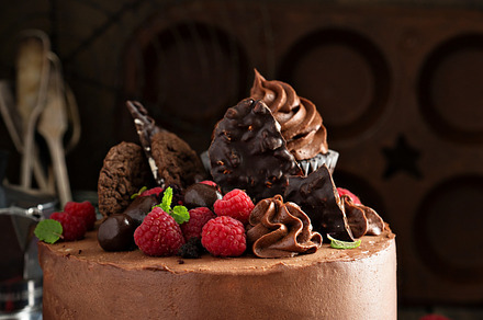 Chocolate cake with ganache frosting and raspberry featuring chocolate, cake, a Food & Drink Photo by farwasser