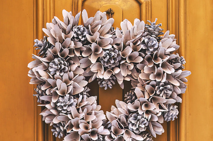 Floral Christmas wreath on yellow
