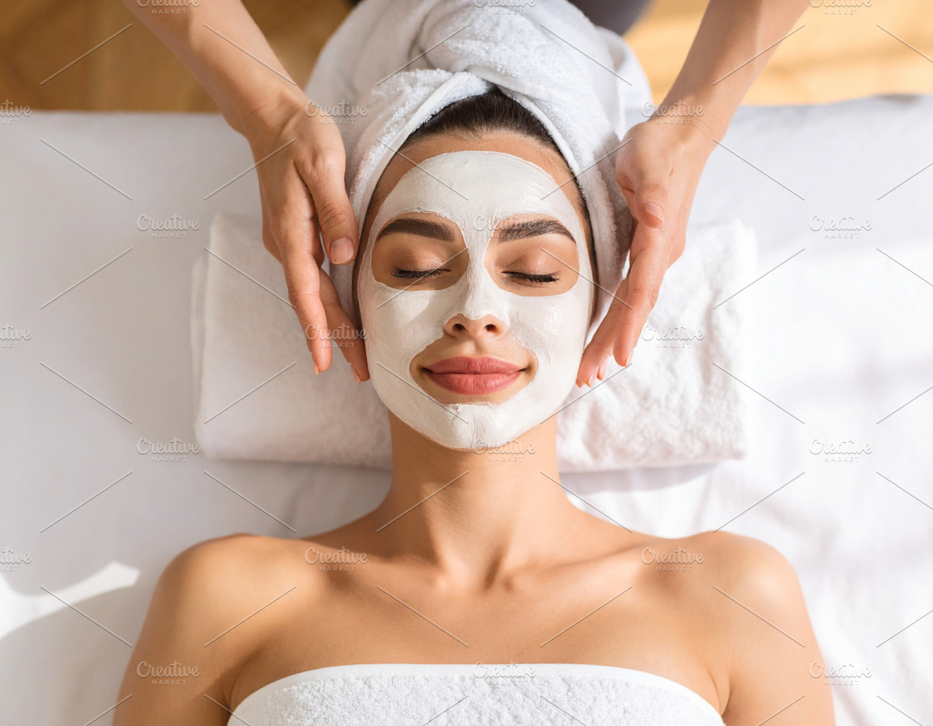 Woman face lying at bed with face mask applied reciving skin tre, a Beauty & Fashion Photo by DanFLCreativo