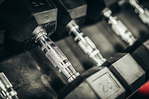 Hex Bells On Rack At A Gym