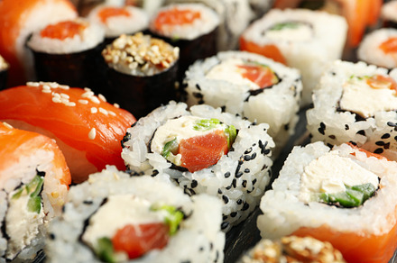 Delicious sushi rolls on wooden background, close up Japanese fo, a Food & Drink Photo by AtlasStudio