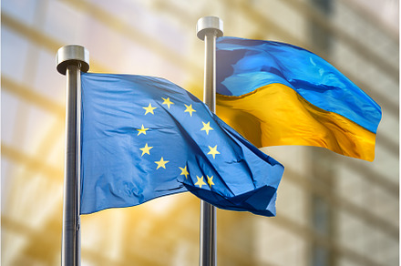 Flags of European Union and Ukraine, a Business Photo by Yaroslav Danylchenko