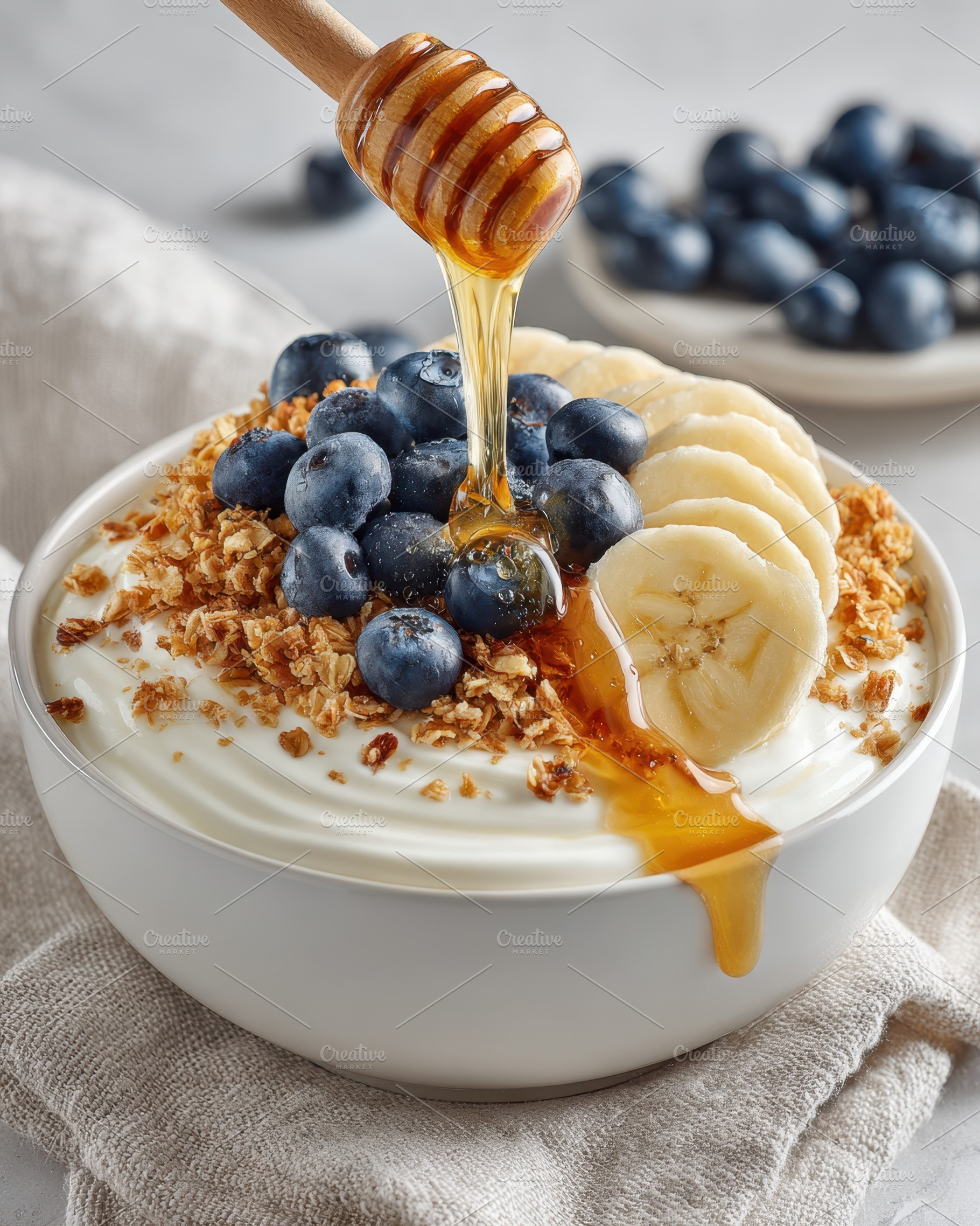 Healthy yogurt bowl with fruits and granola, a Food & Drink Photo by AlyaAnd
