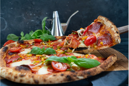 Pizza with salami and tomatoes, a Food & Drink Photo by Neirfy