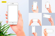 Hands holding iPhone 7 Mockups (New), an iPhone Mockup by Uidea (Thumbnail 1 of 4)