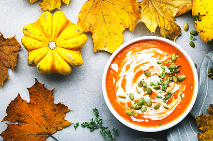Pumpkin creamy soup puree with pumpkin seeds, cream and thyme.., a Food & Drink Photo by 5PH