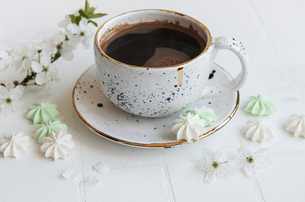 Cup with coffee and small meringues, a Food & Drink Photo by Olena Rudo