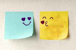 Couple in Love Concept. Two Sticky Notes on the white Wall with, a Photo by salmon.black