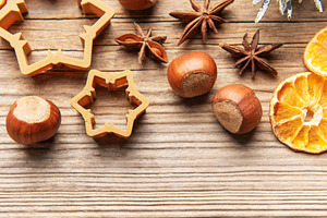 Christmas baking ingredients on rustic wooden background, a Holiday Photo by Olena Rudo