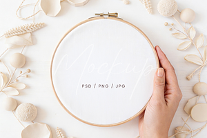 Embroidery Hoop in Hand Mockup, a Product Mockup by TatiMockup