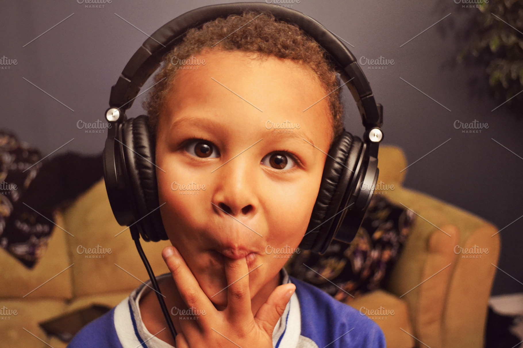 Happy Kid Listening to Music