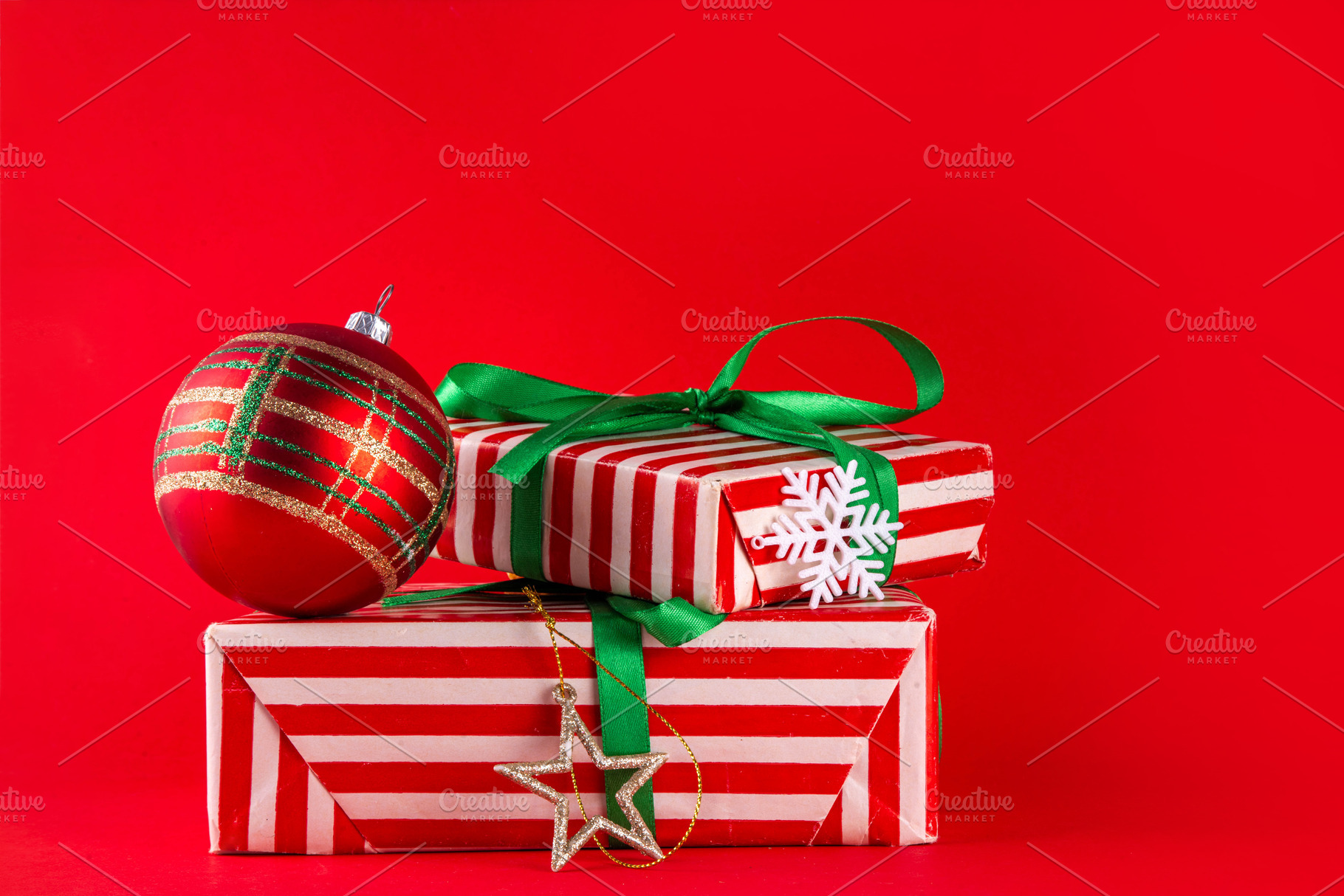 Bright high-colored background with Christmas boxes, festive bau, a Holiday Photo by Rimma