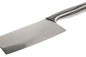 Kitchen knife cleaver with wide blade and metal handle. Close-up, a Food & Drink Photo by ndanko