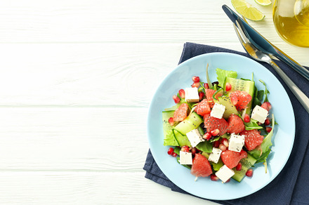 Concept of tasty food, salad with red orange, space for text, a Food & Drink Photo by AtlasStudio