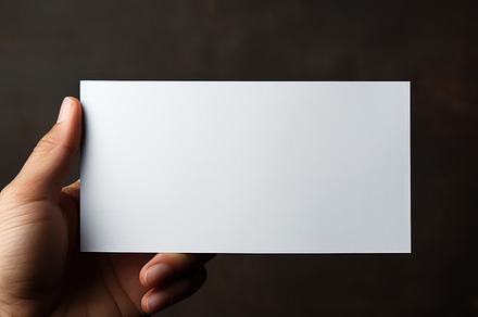 Hand holding blank business card on dark background. Mockup for, a Business Photo by AS photostudio