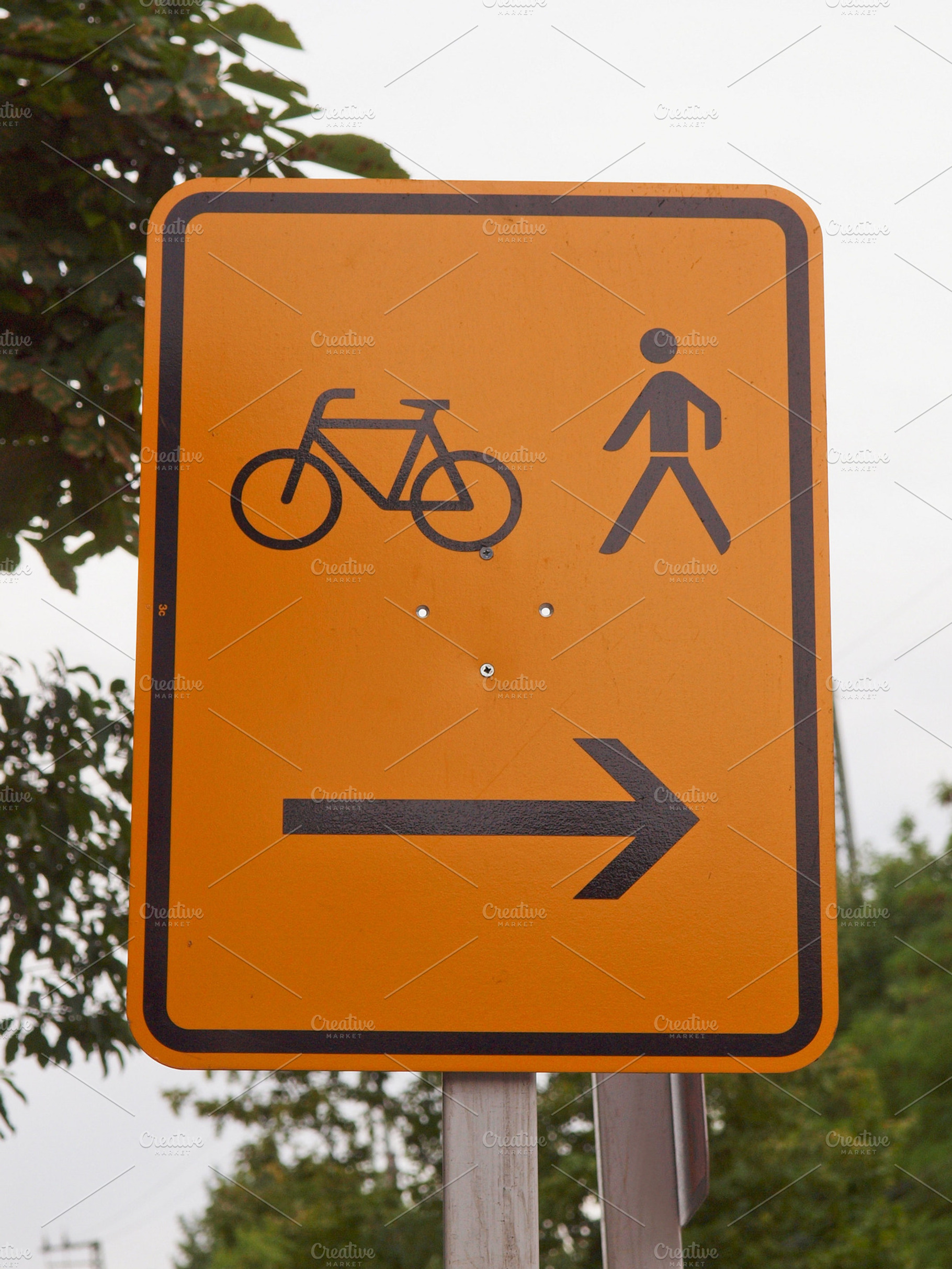 Bike lane sign containing bike, lane, and sign