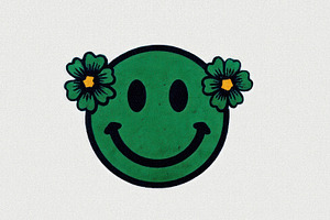 Green smiley face with cartoon flowers on ears against white bac, an Abstract Photo by José Manuel Gelpi