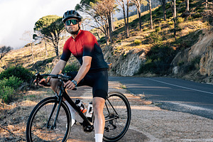 Full length of a bicycle rider, a Sports & Recreation Photo by Artem Varnitsin