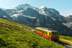 Small retro tourist train, a Transportation Photo by Alpine Dreams