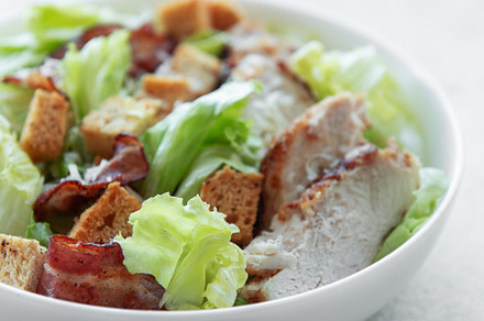 A bowl  of  Caesar salad, a Photo by Olena Rudo