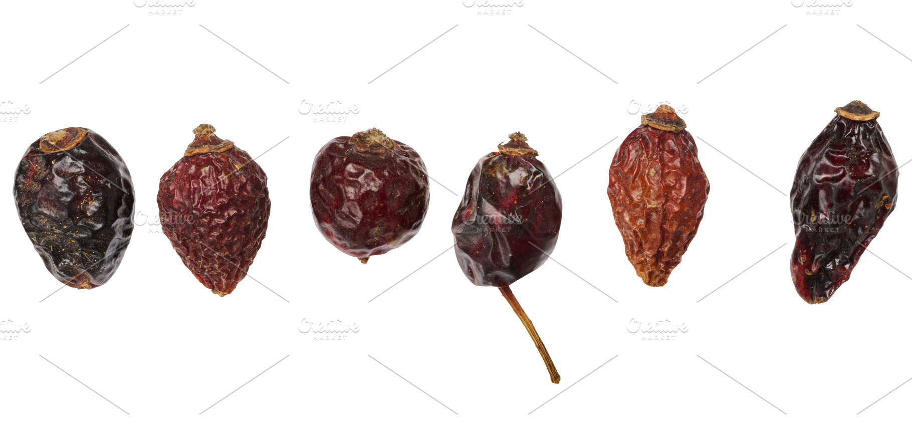 A row of dried rosehip fruits of various shapes and textures, a Food & Drink Photo by ndanko