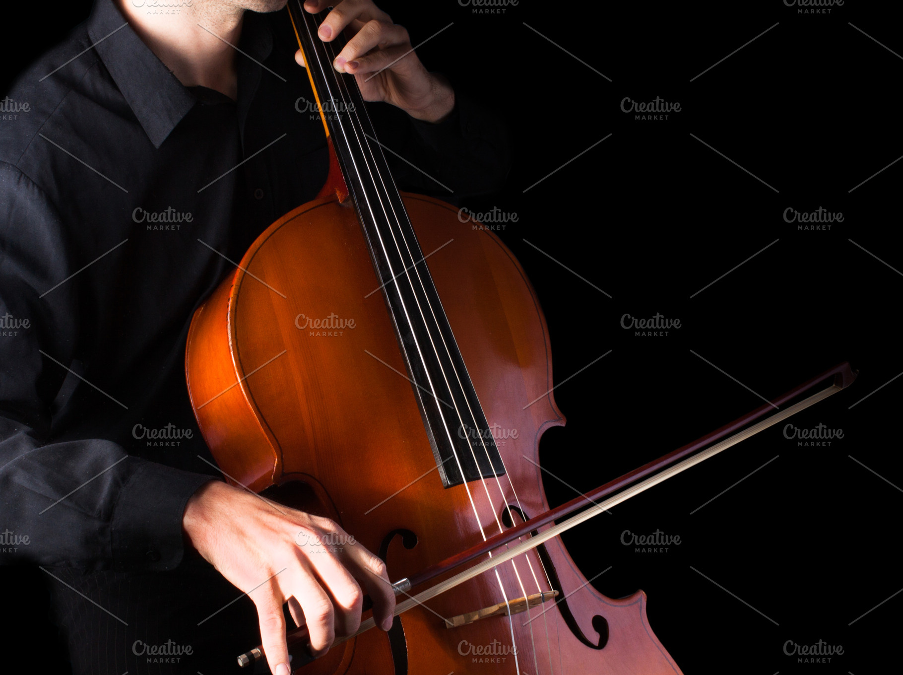 Man playing for cello, a Background Photo by OleksandrRybitskyi