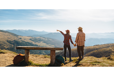 Couple of Hikers With Backpacks in