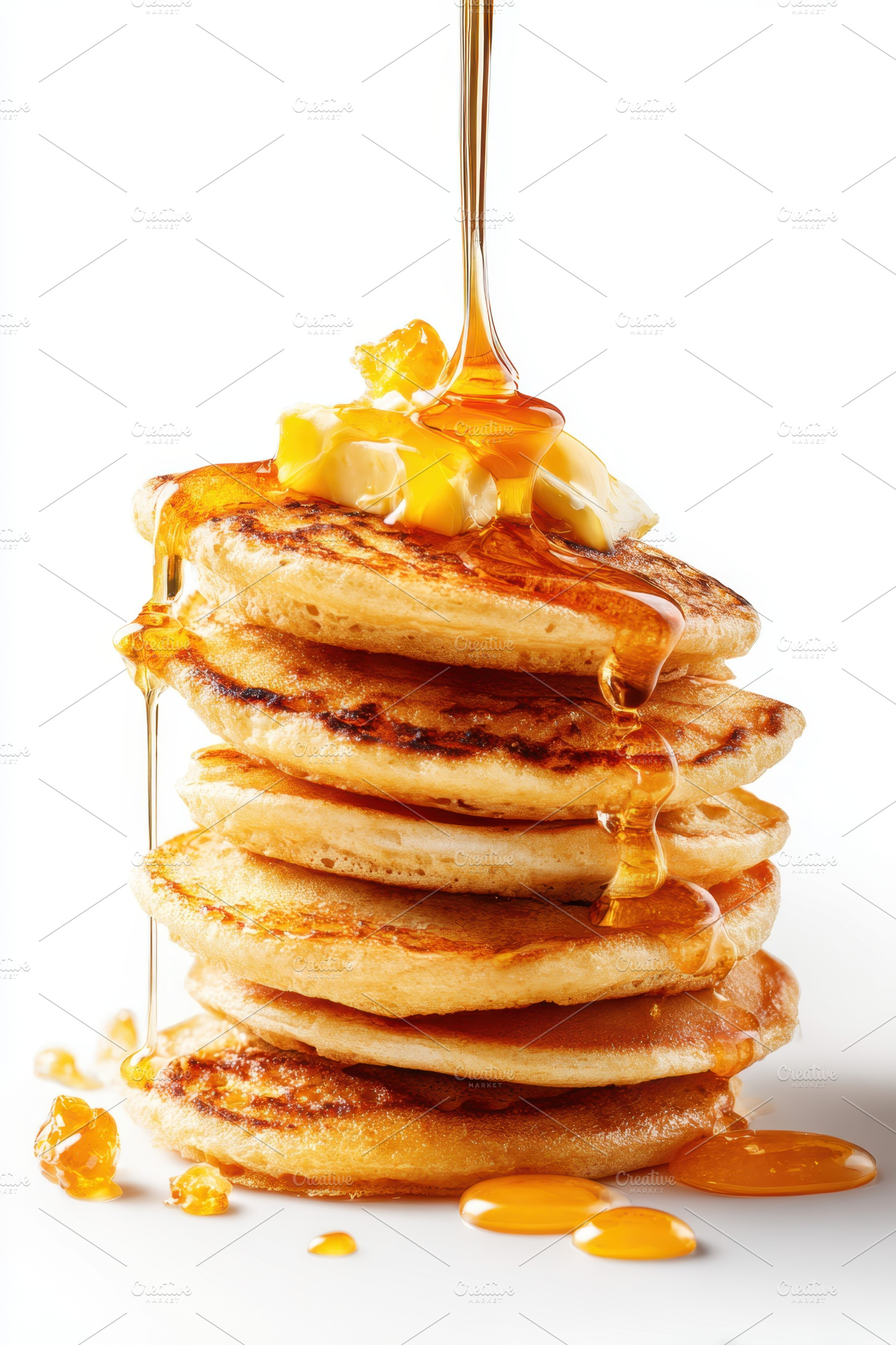 Stack of pancakes with syrup and butter, a Food & Drink Photo by AlyaAnd
