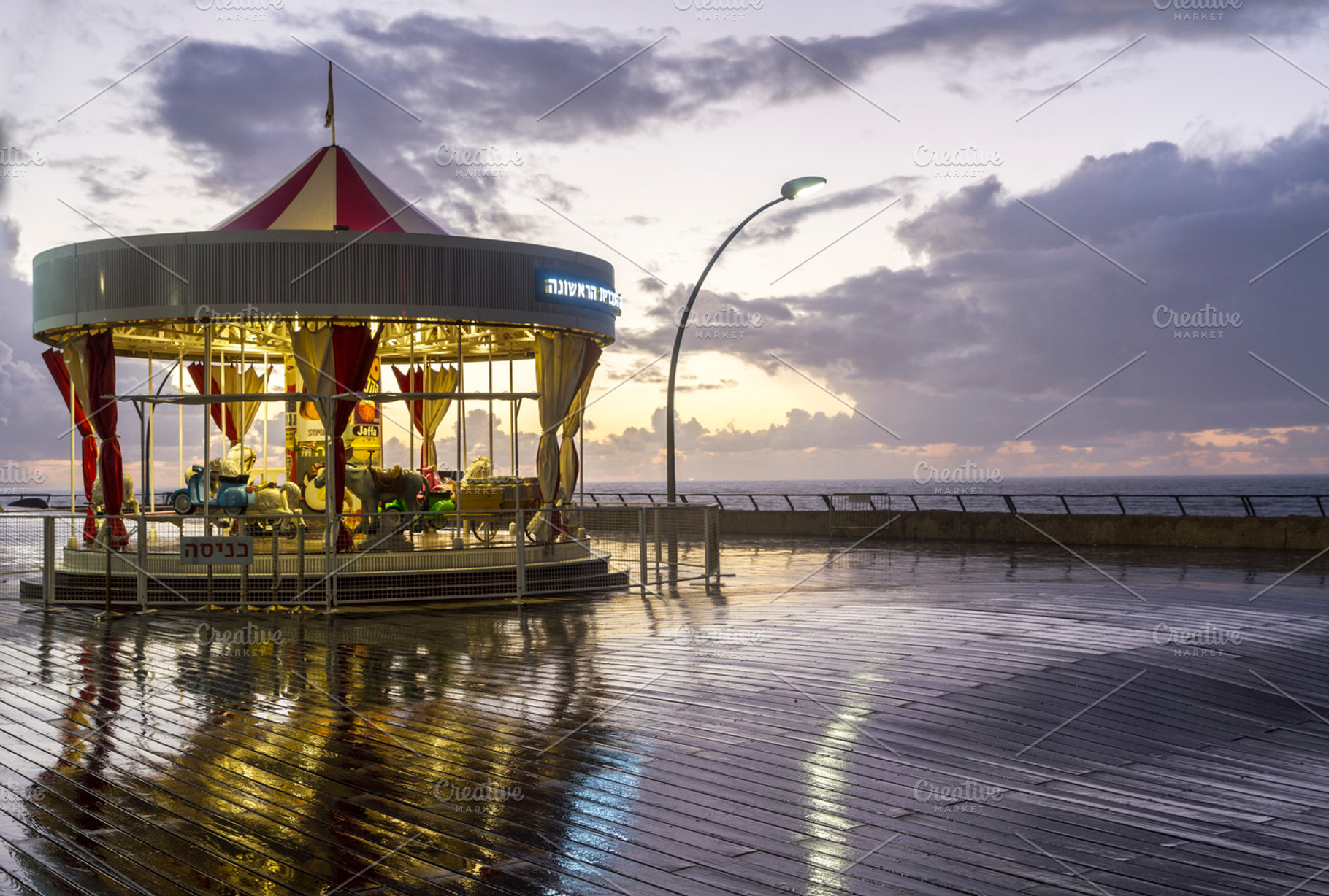 Port telaviv featuring carousel, retro, and sunset, a Nature Photo by suprunvitaly