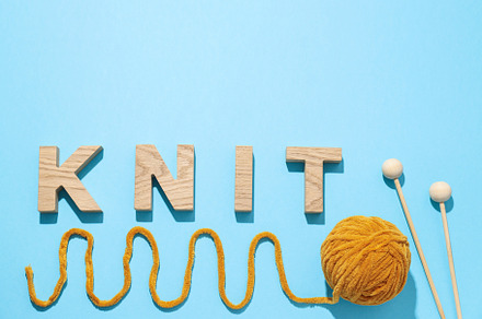 Concept of hobby, knitting, space for text, a Beauty & Fashion Photo by AtlasStudio