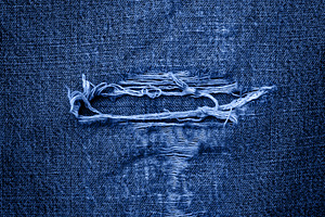 background of old worn jeans