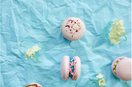 Assorted sweet french pink macarons, a Food & Drink Photo by IlliaBondarPhotography