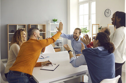 Two teams of happy diverse business, a Person Photo by StudioRomantic