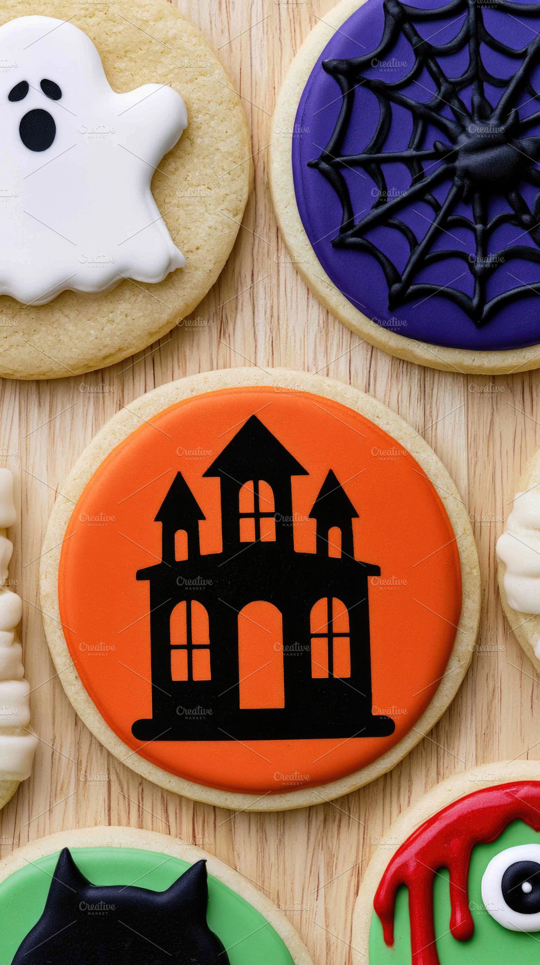 Assorted Halloween sugar cookies with ghosts skulls haunted hous, a Food & Drink Photo by José Manuel Gelpi