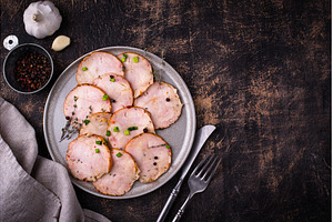 Sliced chicken sausage with herbs, a Food & Drink Photo by Yulia Furman