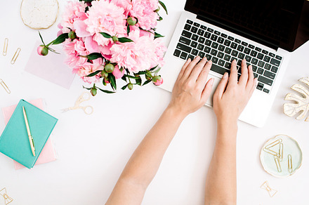 Home office desk with laptop featuring flat, lay, and desk, a Business Photo by Floral Deco
