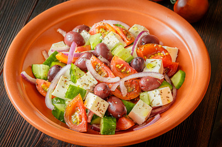 Bowl of Greek salad, a Food & Drink Photo by Alexander Prokopenko