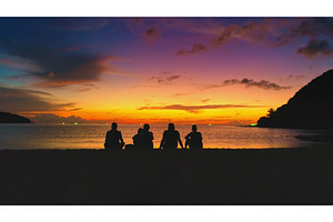 Tourists admiring colorful sunset on, a Nature Photo by Goinyk