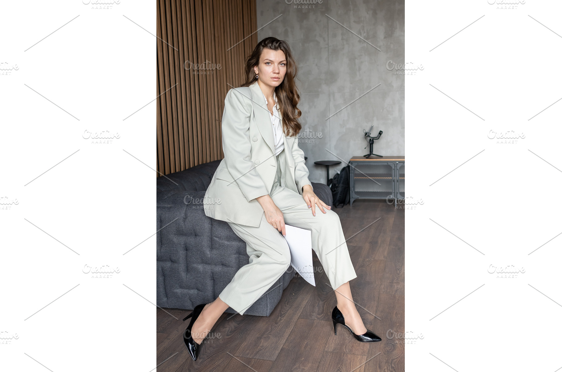 Young businesswoman with long brown, a Business Photo by undrey