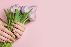 Woman hands with perfect manicure holding beautiful bouquet of p, a Beauty & Fashion Photo by Olena Rudo