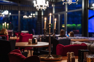 Elegant Restaurant Interior with Candlelight and Cozy Evening Atmosphere, a Background Photo by Red Hot Chili Pepper Shop