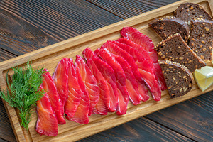 Beetroot Cured Salmon Gravlax With Rye Bread And Fresh Dill, a Food & Drink Photo by Alexander Prokopenko