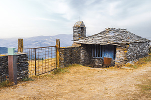 Rustic stone chapel in autumn, an Architecture Photo by SkyNext