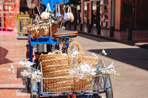 boho-chic blue tricycle in Perpignan, France, a Photo by Nito