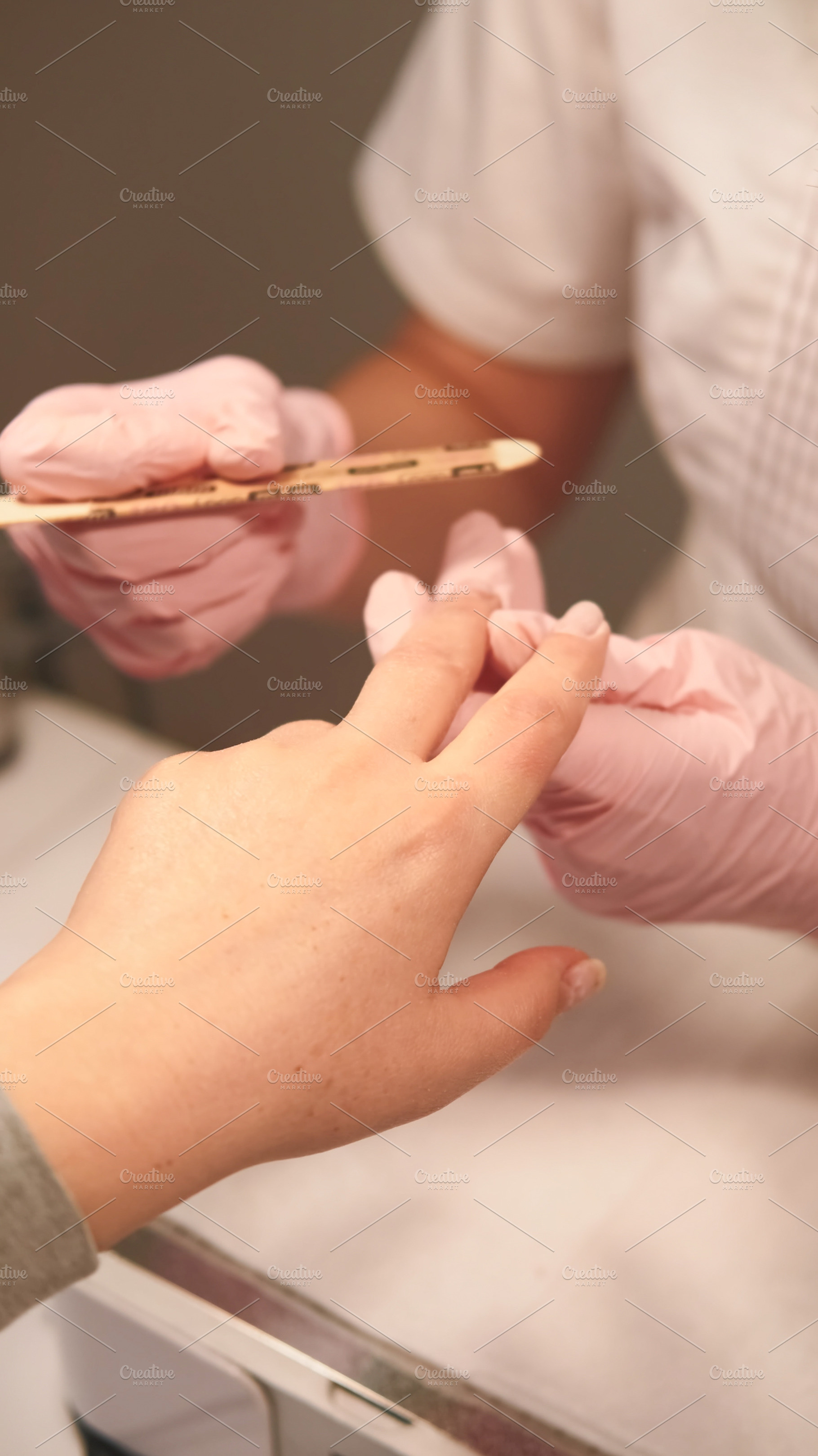 Hand manicure fingernails care shape filing nails, a Person Photo by Photo Drive Studio