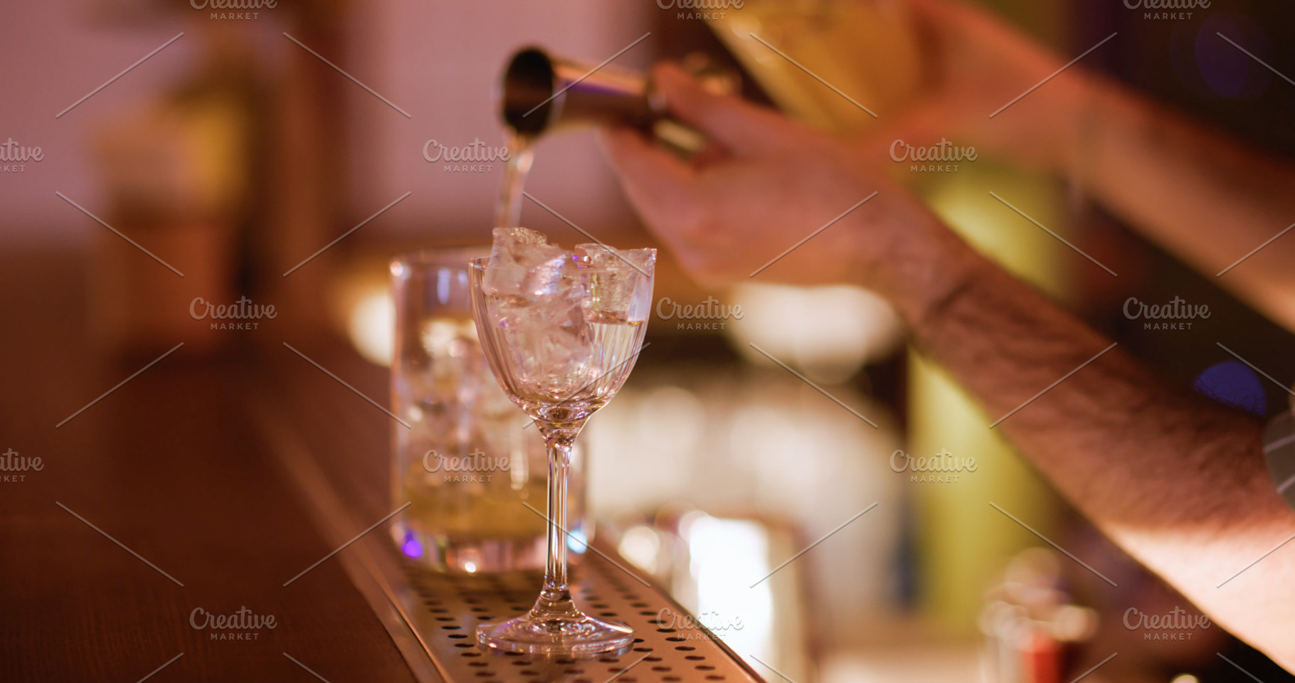 Cocktail making using jigger barman drink glass, a Food & Drink Photo by Photo Drive Studio